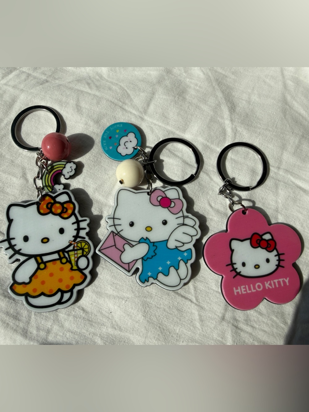 Hello Kitty Keychain Trio - Pink, Blue, Yellow, White
